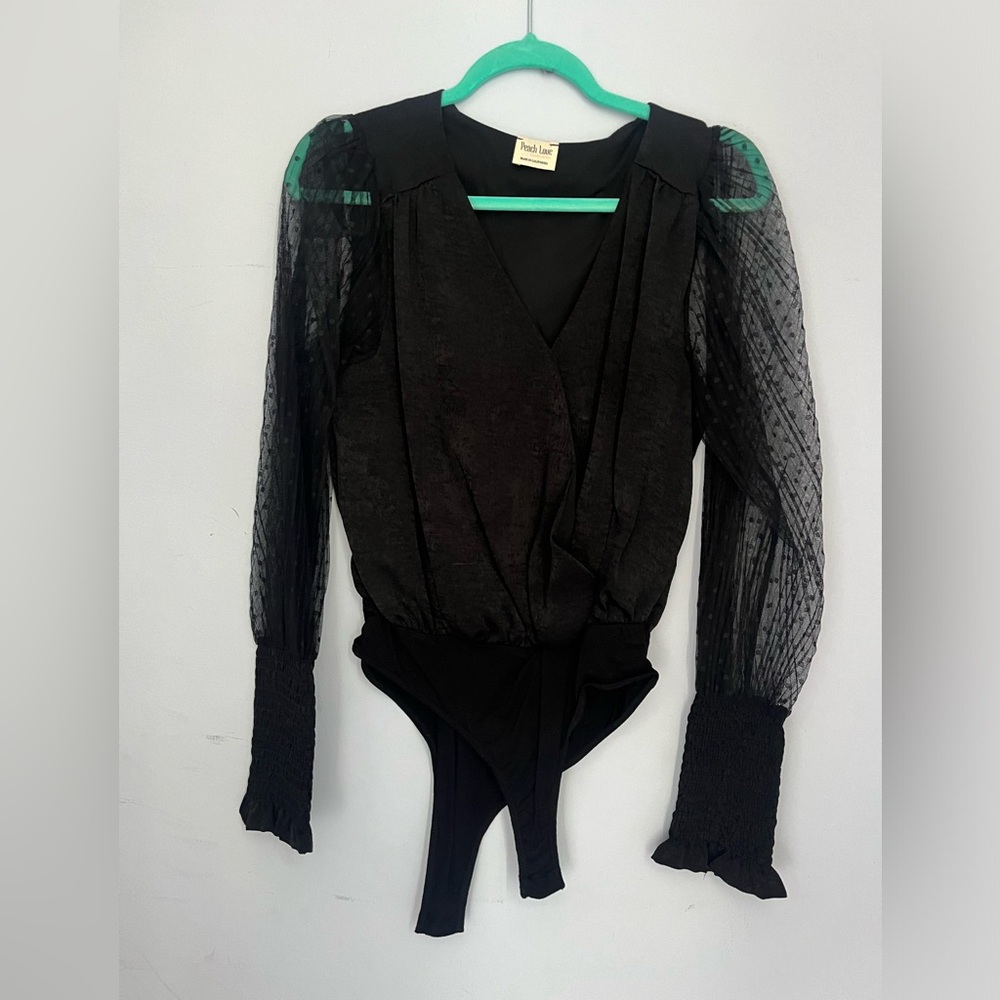 Peach love California bodysuit. With sheer sleeves. Size medium.